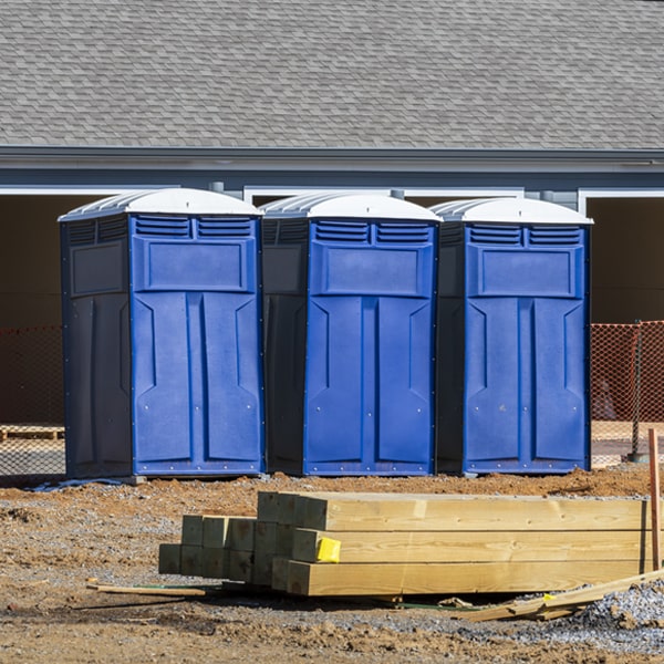what is the cost difference between standard and deluxe portable restroom rentals in Bradley SD